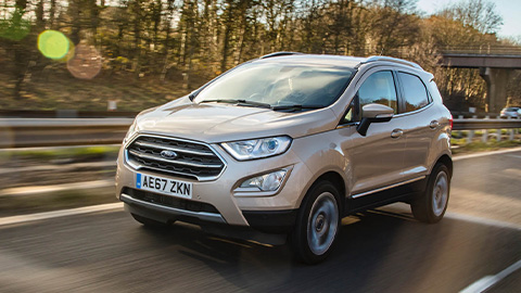 Beige Ford EcoSport, driving