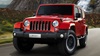 Red Jeep Wrangler Exterior Front Driving